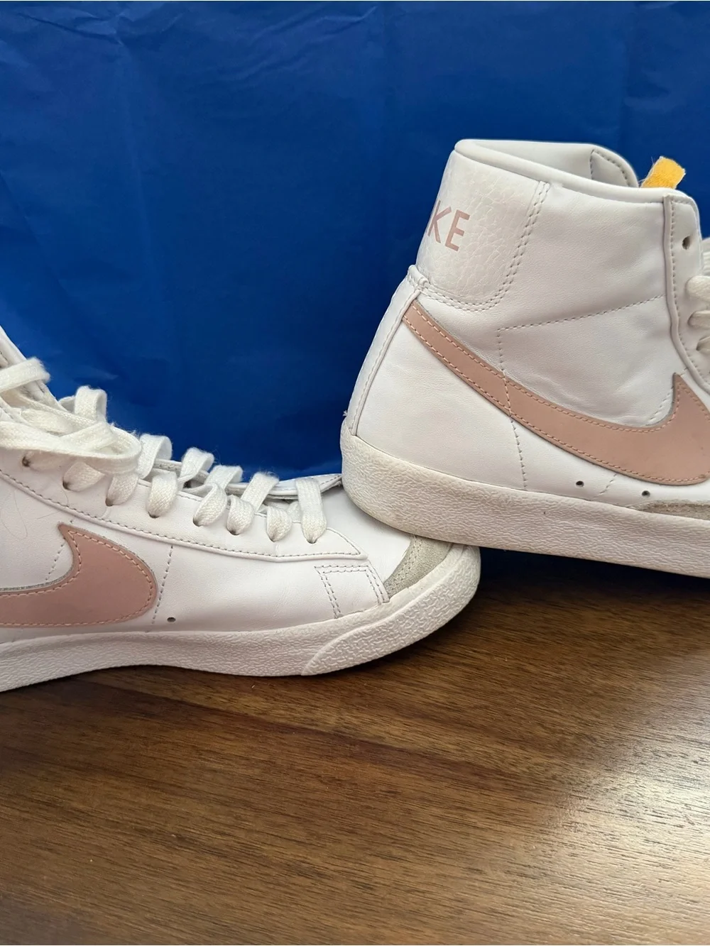 Nike Women's White High-Top Sneakers with Blush Swoosh and Yellow Tongue Accent